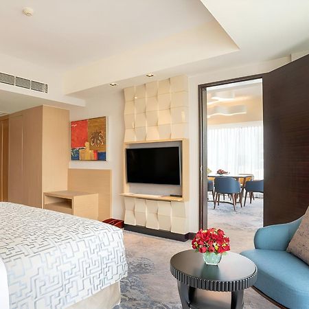 Cinnamon Grand Colombo Exterior foto A bedroom at the hotel